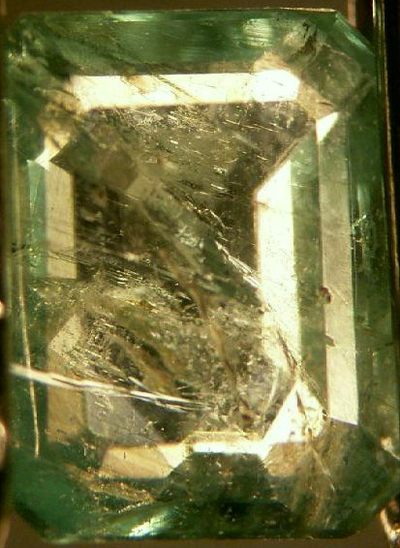 Emerald showing inclusions